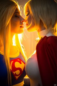 Supergirl and Power Girl about to kiss.jpg