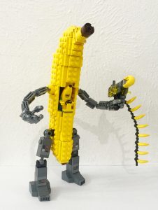 banana man in banana mech shooting a banana gun.jpg