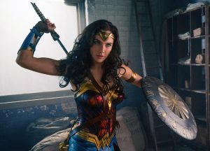 wonder woman has blue eyes and a sword.jpg